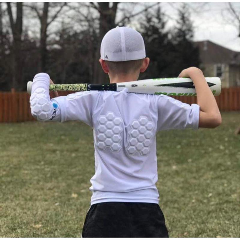Back view of youth player wearing padded shirt