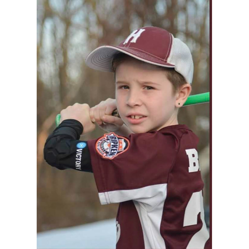Baseball player warming up in Victory padded gear