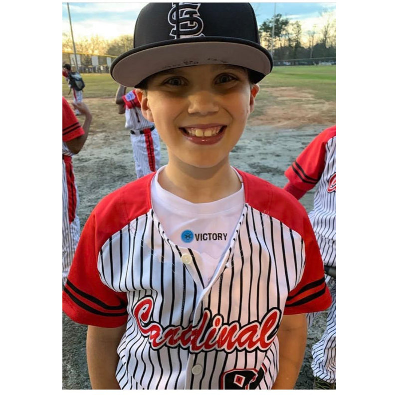 Portrait of young athlete wearing Victory gear